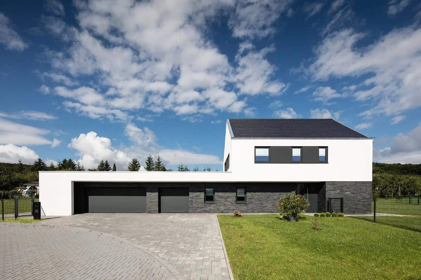 Neubau modernes Einfamilienhaus mit Natursteinsockel (Schiefer) in Haynrode, Eichsfeld, Architekt, Sachverständiger und zertifizierter Gutachter nach DIN EN ISO/IEC 17024 Dr. Michael Flagmeyer