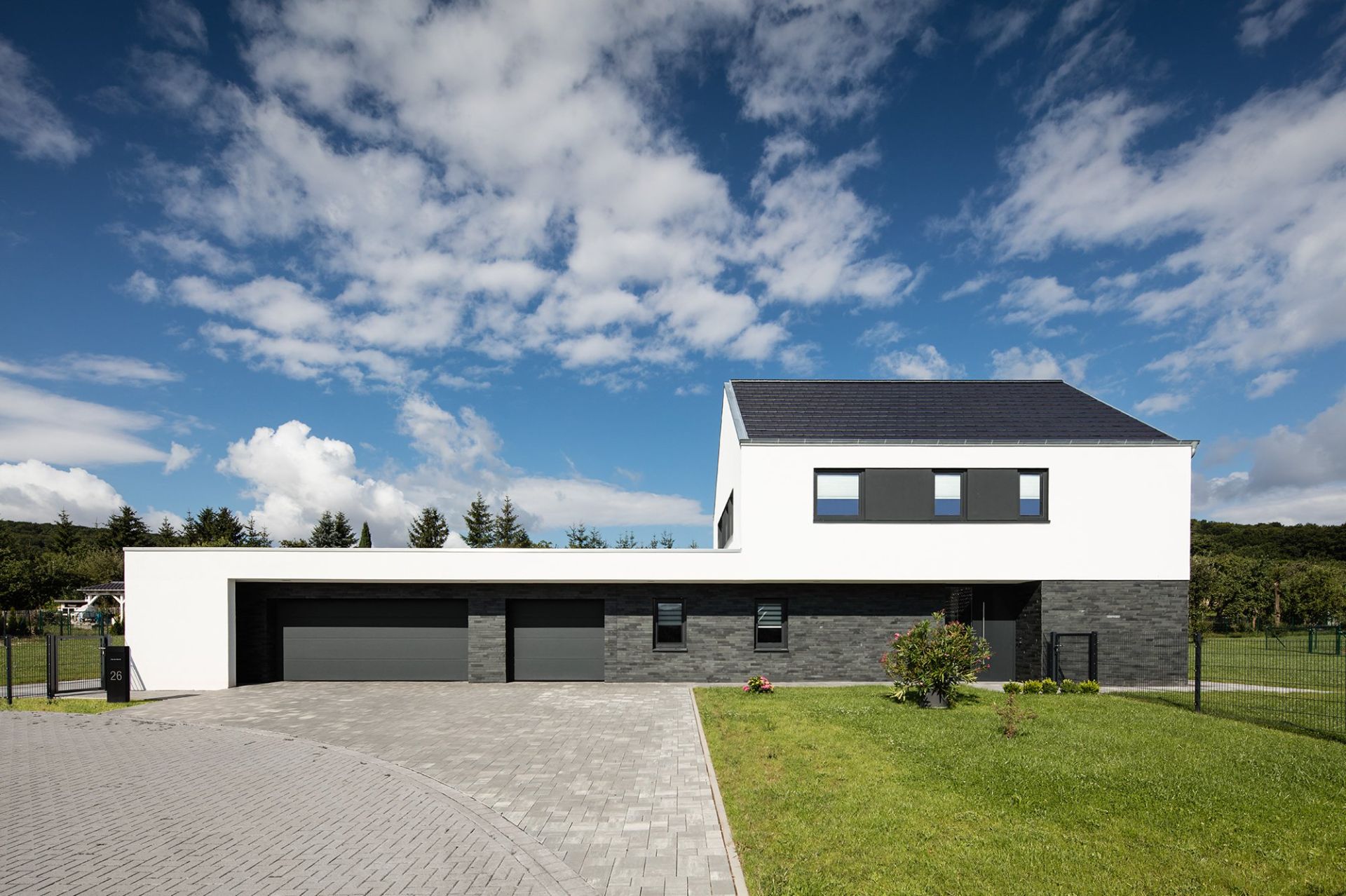 Neubau modernes Einfamilienhaus mit Natursteinsockel (Schiefer) in Haynrode, Eichsfeld, Architekt Michael Flagmeyer