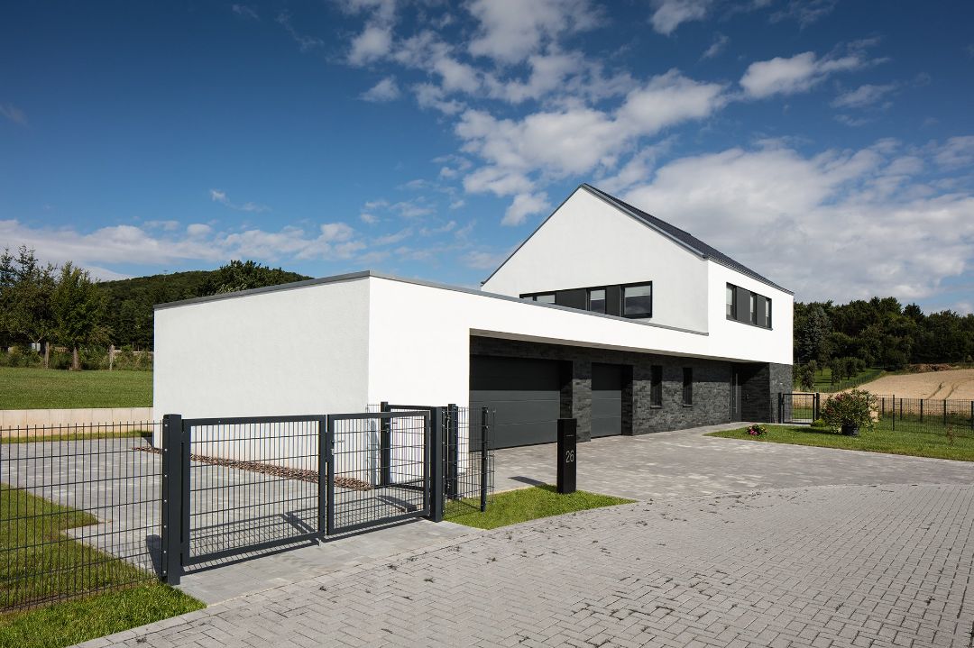 Neubau modernes Einfamilienhaus mit Natursteinsockel (Schiefer) in Haynrode, Eichsfeld, Architekt Michael Flagmeyer